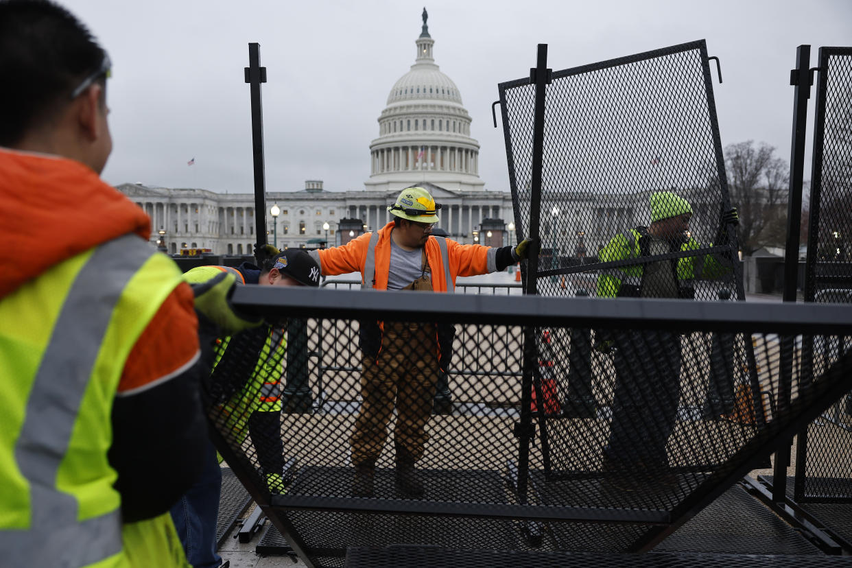 WASHINGTON, DC - MARCH 06: Eight-feet-tall steel fencing is put up around the U.S. Capitol the day before President Joe Biden is to deliver the State of the Union address on March 06, 2024 in Washington, DC. The security fence has been erected during each of the president's annual addresses since the attacks of January 06, 2021.  (Photo by Chip Somodevilla/Getty Images)