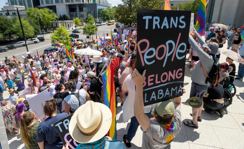 Protestors gather on the Alabama State Supreme Court steps as they participate in the Drag Me to the Capitol march and rally against anti-trans bills in Montgomery, Alabama, on Tuesday, May 16, 2023.  The march went from the State Supreme Court building to the State Capitol and then to the Alabama Statehouse.