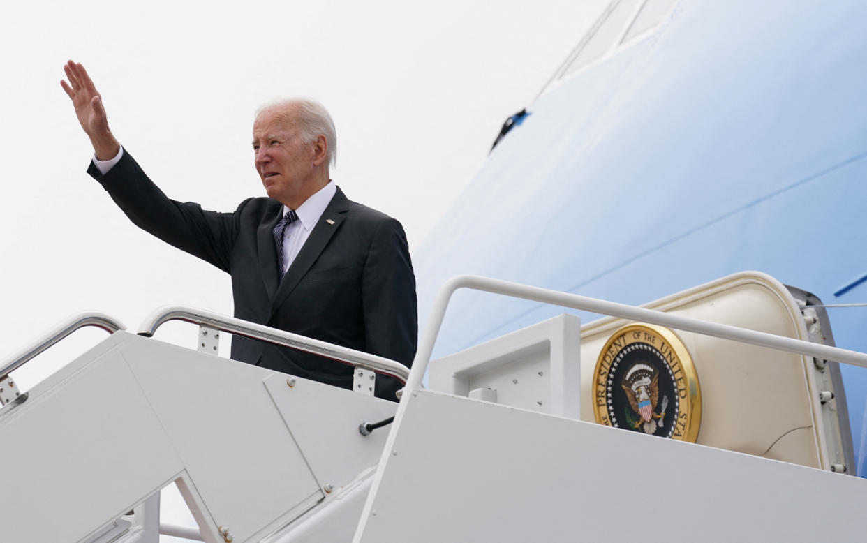 U.S. President Joe Biden waves as he boards Air Force One upon departure for Boston from Joint Base Andrews in Maryland, U.S., September 12, 2022. REUTERS/Kevin Lamarque