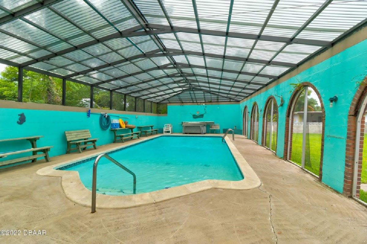 Enjoy the privacy of this large pool, which is enclosed in its own area with LEXAN roof panels.