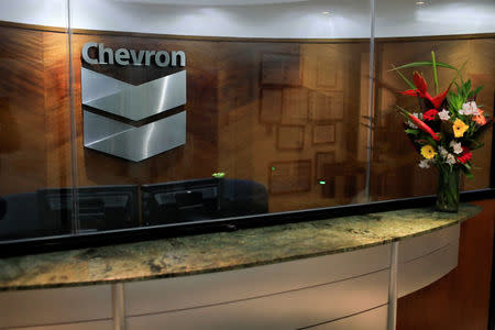 The logo of Chevron is seen at the company's office in Caracas, Venezuela April 25, 2018. REUTERS/Marco Bello