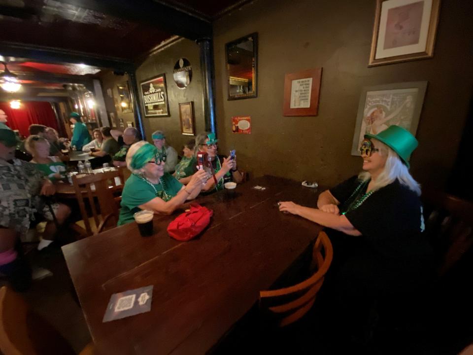 (From left) Jerry Liberty, Betty Chavez and Jody Skeltoe enjoy the Blessing of the Beer event at the Tasting Room of Louisiana in downtown Alexandria. The women are visiting the area from New Mexico.