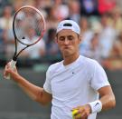 Australia's hopes are pinned on veteran campaigner Lleyton Hewitt and the unpredictable Bernard Tomic, pictured here at Wimbledon last year