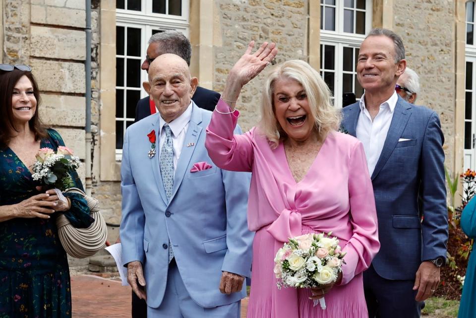 Terens and Swerlin celebrate their wedding at the town hall of Carentan-les-Marais in Normandy, northwestern France, on Saturday, June 8, 2024 (AP)