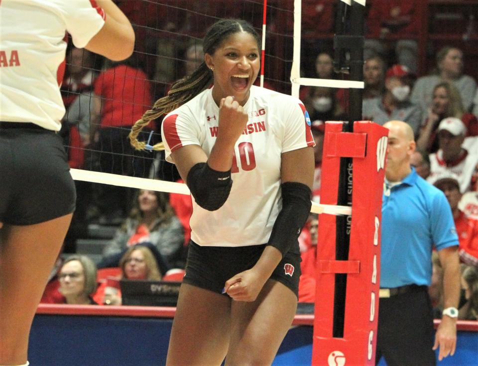 Wisconsin's Devyn Robinson celebrates a point during the team's sweep of Quinnipiac on Friday.