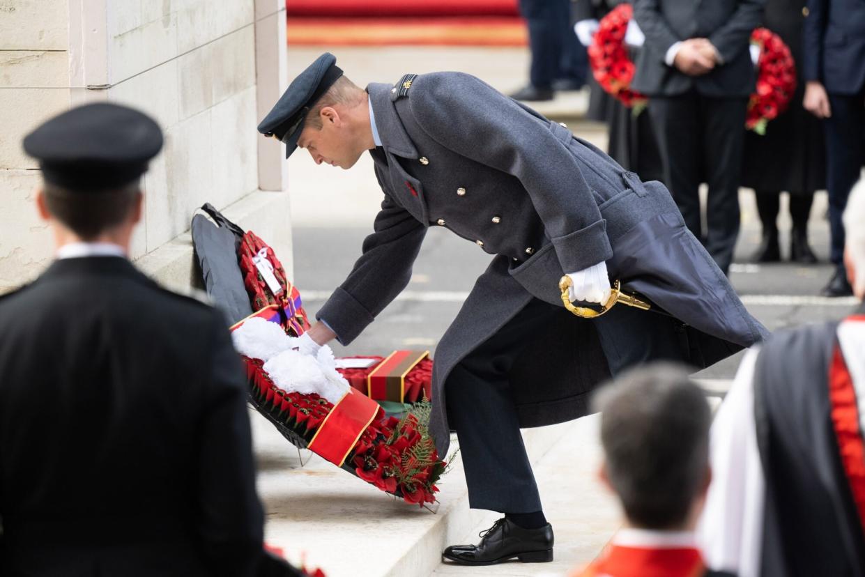 LONDON, ENGLAND - NOVEMBER 13: Prince William, Prince of Wales lays a wreath during the National Service Of Remembrance at The Cenotaph on November 13, 2022 in London, England. (Photo by Samir Hussein/WireImage)