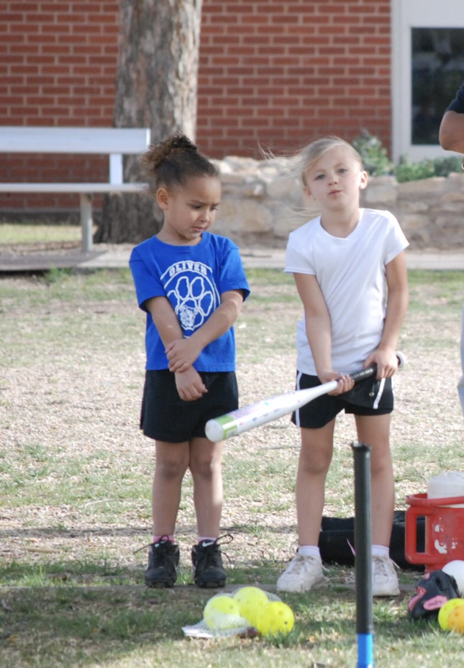 Laylonna Applin and Shandlee Mueller have played softball together since their adolescence.