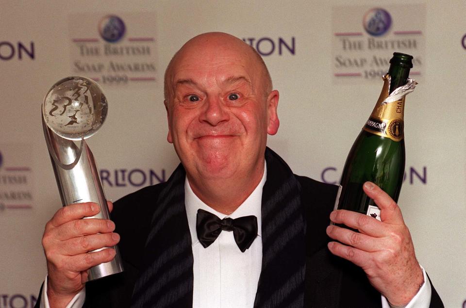 Actor John Savident, who plays Fred Elliot in soap Coronation street, picks up the top award on behalf of the programme being chosen Best Soap by TV viewers, at Carlton TV's British Soap Awards 1999. The actor won the award for Best Comedy Performance.  * 1/12/2000:  The Coronation Street actor, 62, who plays butcher Fred Elliott, is in hospital with neck wounds after an incident at his flat near Granada Studios in Manchester. 20/06/01  Coronation Street actor John Savident, who plays Fred Elliot in the soap. The trial of Michael Smith, who is accused of stabbing Mr Savident, is due to start at Manchester Crown Court.  Smith, 28, of Ashton-under-Lyne, Greater Manchester, is accused of wounding Mr Savident, 62, with intent to cause him grievous bodily harm on 1/12/00. He is also charged with robbing him of a wallet, credit cards, keys, a watch, a ring, money clip, an invitation card and cash on the same date. Smith denies both charges.   (Photo by Michael Crabtree - PA Images/PA Images via Getty Images)