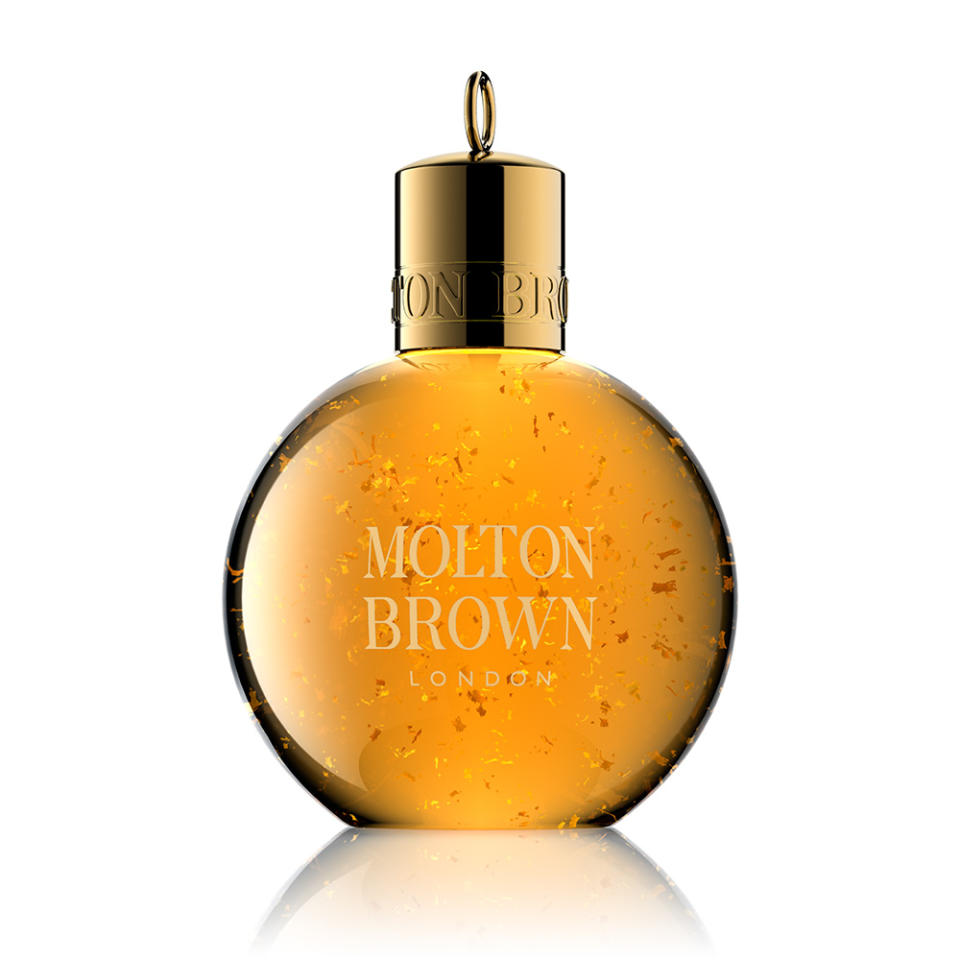 <p><a rel="nofollow noopener" href="http://www.moltonbrown.co.uk/store/gifts/stocking-fillers/mesmerising-oudh-accord-gold-festive-shower-gel-bauble/KDK081/" target="_blank" data-ylk="slk:Molton Brown, £11;elm:context_link;itc:0;sec:content-canvas" class="link "><em>Molton Brown, £11</em></a> </p>