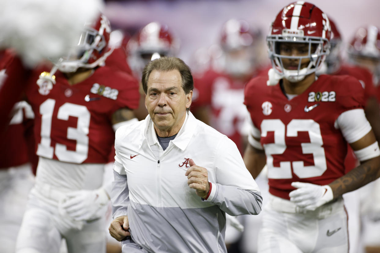 INDIANAPOLIS, IN - JANUARY 10: Alabama Crimson Tide head coach Nick Saban leads his team to the field prior to the CFP National Championship college football game against the Georgia Bulldogs on Jan. 10, 2022 at Lucas Oil Stadium in Indianapolis, Indiana. (Photo by Joe Robbins/Icon Sportswire via Getty Images)