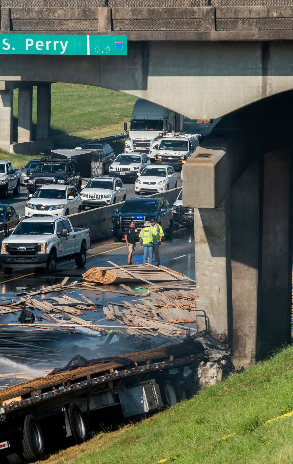 The scene of a wreck on I-85 that damaged the Perry Street overpass and shut down the southbound lanes of I-85 in Montgomery, Ala., on Tuesday morning August 29, 2023.