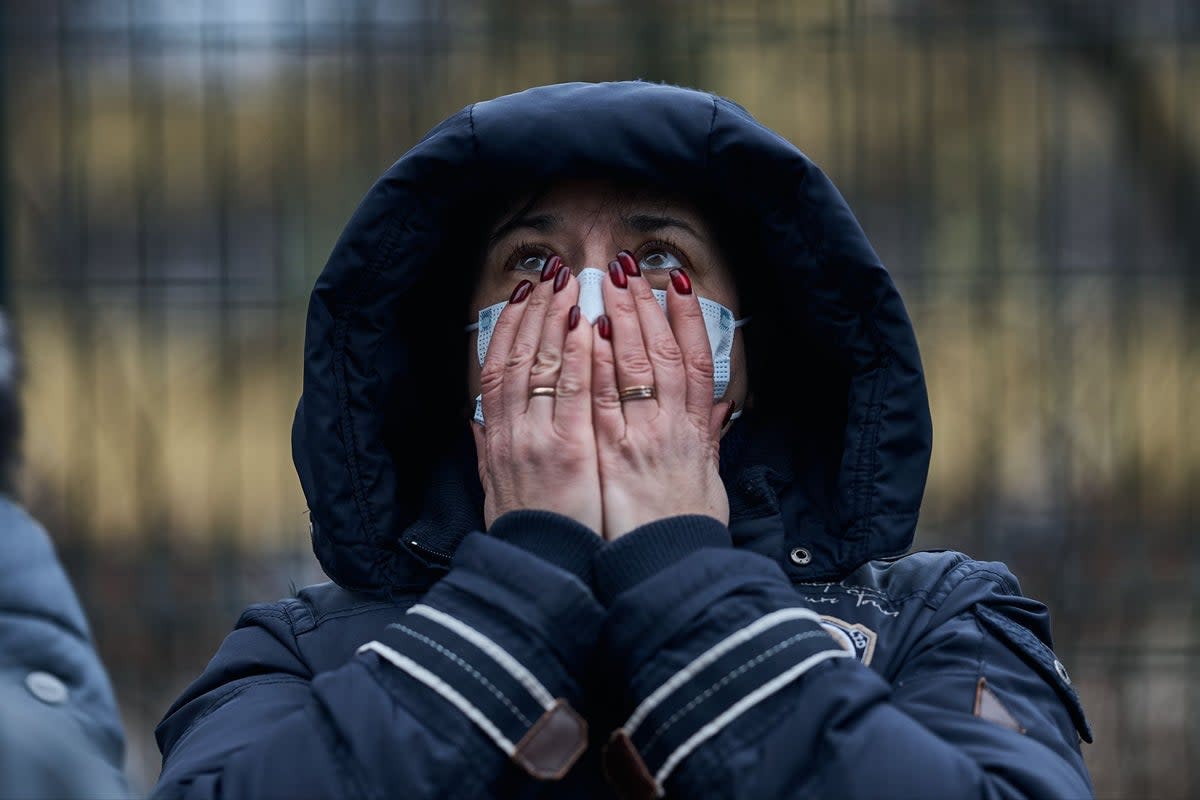A Kyiv resident looks on in horror (Getty Images)