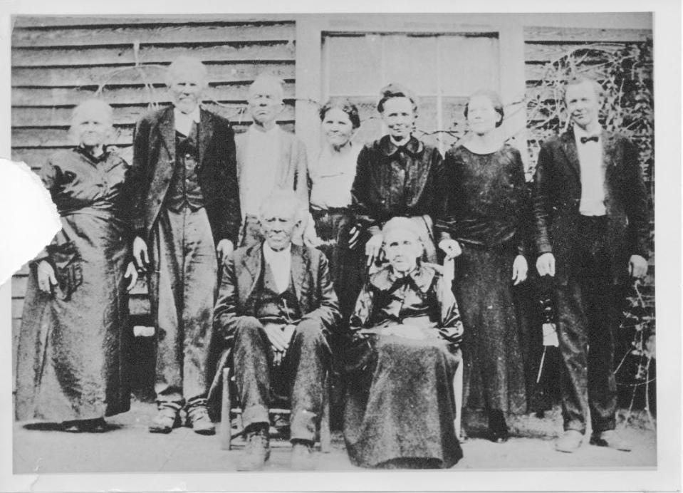 Dr. Levi Jones (1836-1929) is seated with his family. He served in the Union Army during the Civil War and returned to Henderson County to farm, operate zircon mines, and work as a country doctor using his wartime medical training.