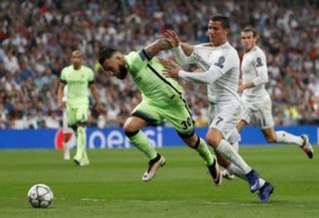 Football Soccer - Real Madrid v Manchester City - UEFA Champions League Semi Final Second Leg - Estadio Santiago Bernabeu, Madrid, Spain - 4/5/16 Real Madrid's Cristiano Ronaldo in action with Manchester City's Nicolas Otamendi Reuters / Juan Medina Livepic EDITORIAL USE ONLY.