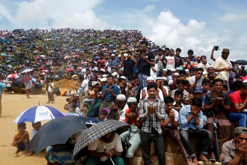 FILE PHOTO: Rohingya refugees take part in a prayer as they gather to mark the second anniversary of the exodus at the Kutupalong camp in Cox’s Bazar