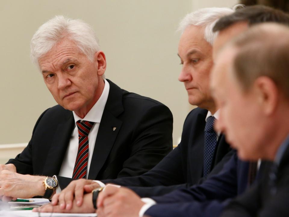 Russian tycoon Gennady Timchenko, left, attends a meeting of Russian President Vladimir Putin, right, with French businessmen in the Kremlin in Moscow, Russia, Wednesday, May 25, 2016.