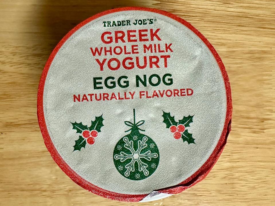 white, red, and green container of trader joe's eggnog greek yogurt