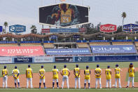 The Los Angeles Dodgers players honor the memories of Kobe and Gianna Bryant during pregame ceremonies before a baseball game against the Colorado Rockies in Los Angeles, Sunday, Aug. 23, 2020. (AP Photo/Alex Gallardo)