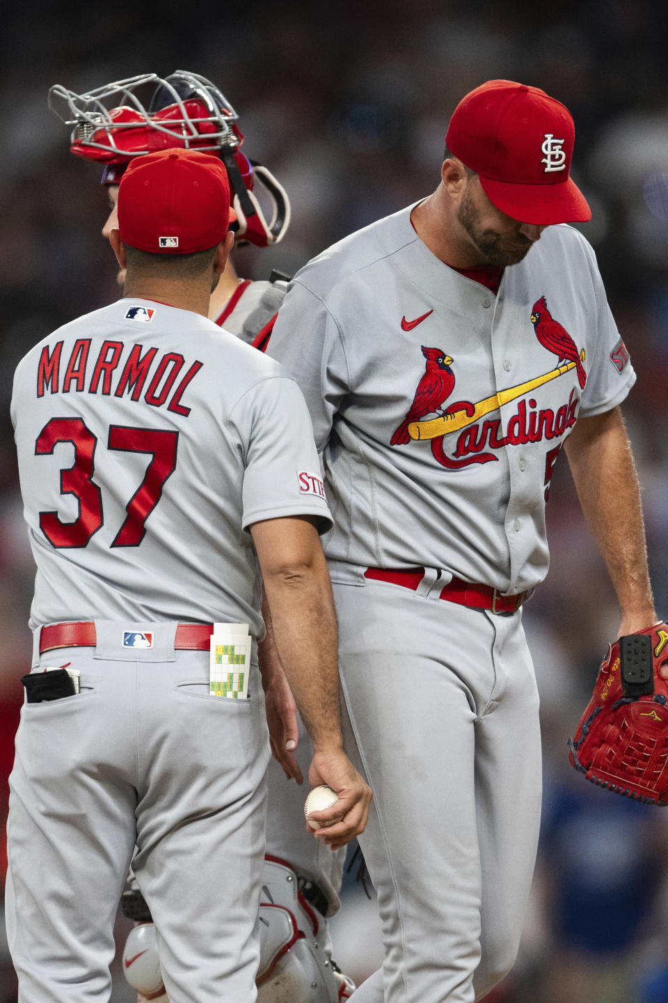 St. Louis Cardinals manager Oliver Marmol removes starting pitcher Adam Wainwright during the sixth inning of the team's baseball game against the Atlanta Braves, Thursday, Sept. 7, 2023, in Atlanta. (AP Photo/Hakim Wright Sr.)