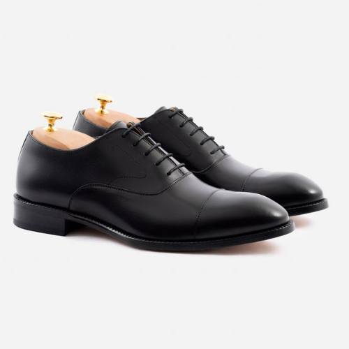 black beckett simonon loafers against white background