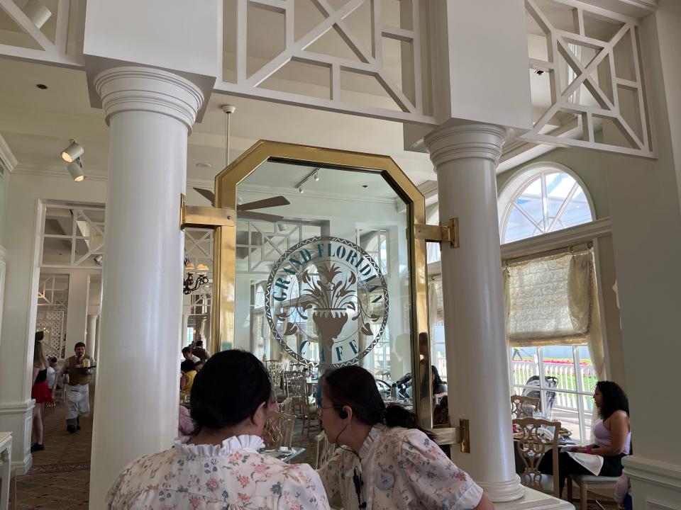 entrance to the grand floridian cafe at the grand floridian resort