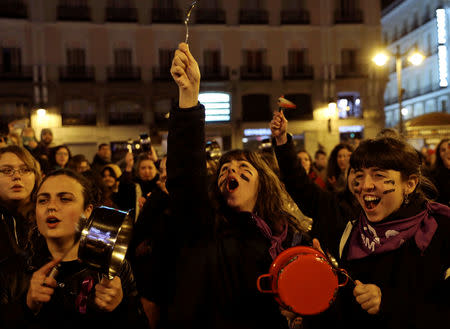 Women bang pots and pans during a protest at the start of a nationwide feminist strike on International Women's Day at Puerta del Sol Square in Madrid, Spain, March 8, 2019. REUTERS/Susana Vera