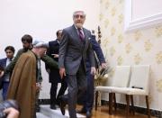 Afghanistan's presidential candidate Abdullah Abdullah arrives for a speech after the final presidential election results in Kabul