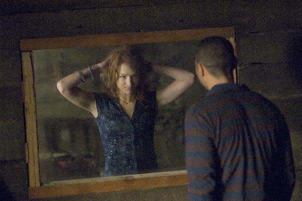 In this film image released by Lionsgate, Kristen Connolly and Jesse Williams are shown in a scene from "The Cabin in the Woods." (AP Photo/Lionsgate, Diyah Pera)