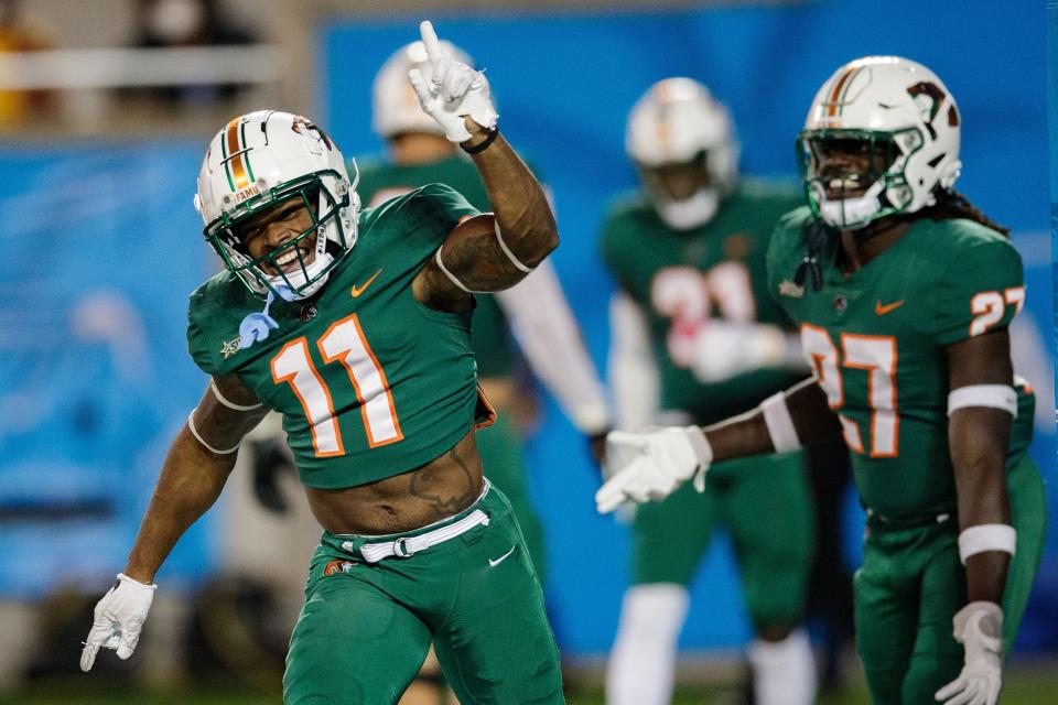 Florida A&M defensive back BJ Bohler (11) celebrates his touchdown. The Rattlers defeated the Bethune-Cookman Wildcats 46-21 during the Florida Classic at Camping World Stadium on Saturday, Nov. 20, 2021.