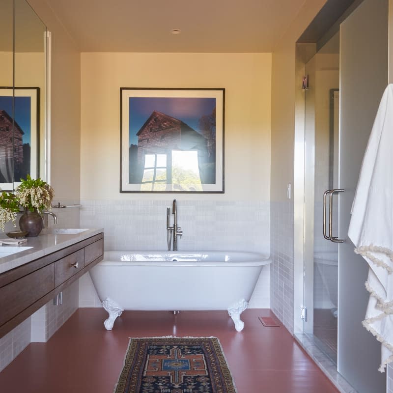 Claw foot tub in bathroom.