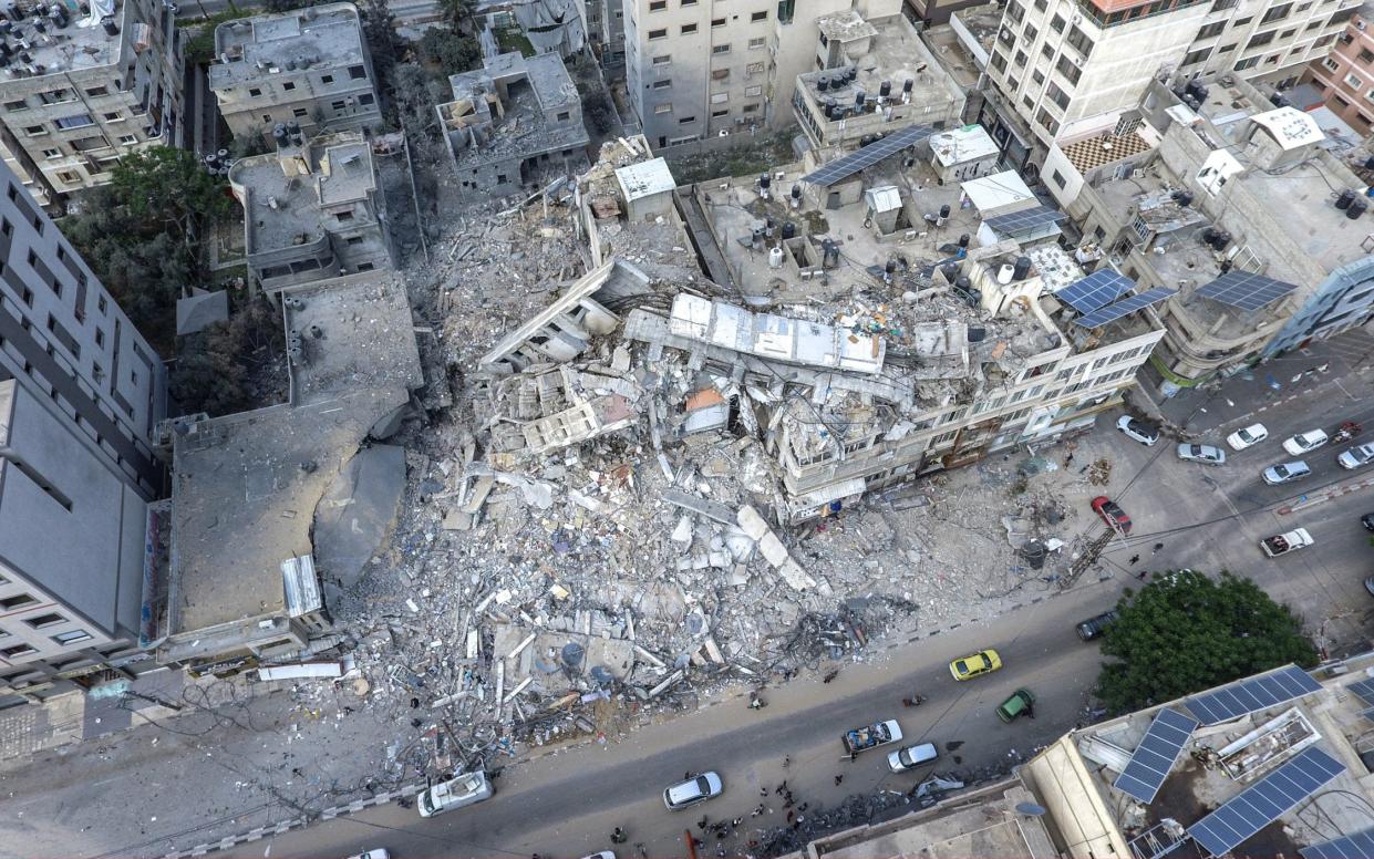 A drone photo of the remains of the 14-storey al-Shorouk tower, which housed local and foreign media outlets until it was destroyed in an Israeli airstrike - Ali Jadallah/ Anadolu Agency