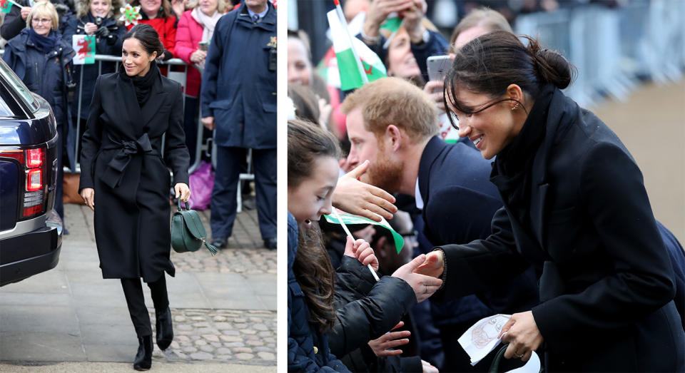 Prince Harry and Meghan Markle greet the bustling crowds at Cardiff Castle [Photo: Getty]