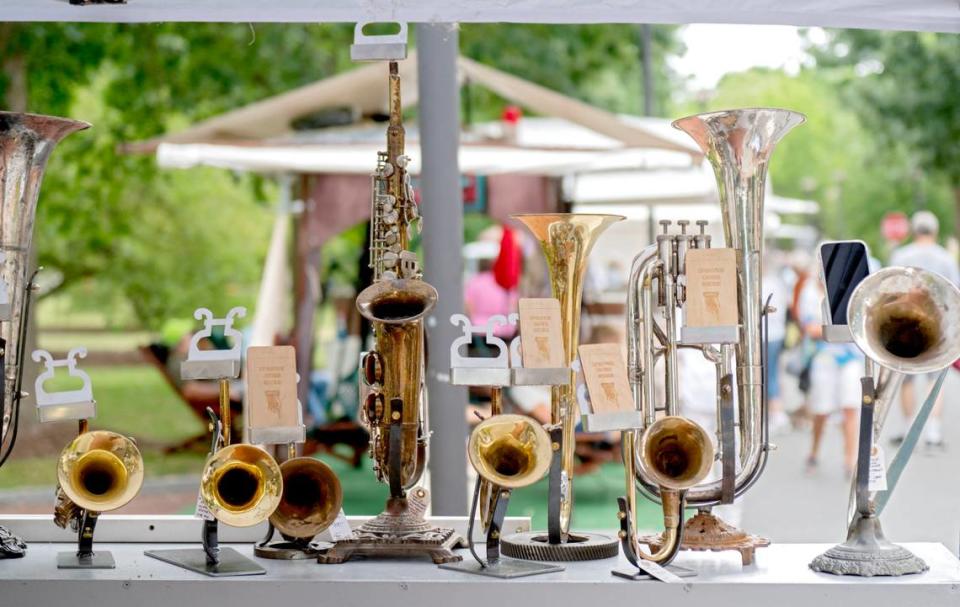 Old instruments that have been transformed into speakers at Christopher Locke’s booth at the Central Pennsylvania Festival of the Arts on Thursday, July 11, 2024.