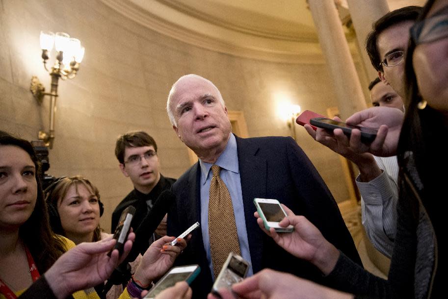 FILE - In this Oct. 11, 2013, file photo, Sen. John McCain, R-Ariz. talks to reporters on Capitol Hill in Washington, upon his return from a two-hour meeting at the White House between President Barack Obama and Republican senators, trying to come up with a bipartisan solution to the budget stalemate. Sen. McCain says the Arizona Republican Party¹s censure of him over the weekend may just motivate him to run for a sixth term. The censure vote came during a meeting of state committee members who cited McCain¹s voting record as being insufficiently conservative. The members say McCain has campaigned as a conservative but has lent his support to immigration reform and funding President Obama¹s national health care initiative. (AP Photo/J. Scott Applewhite, File)