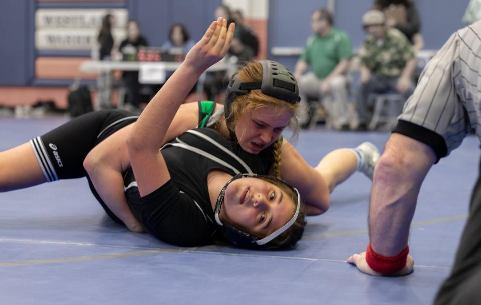 Bella Wojciechowski of Thousand Oaks is control of her opponent during the Marmonte League wrestling finals on Friday at Westlake High. Wojciechowski 
won the the 137-pound title.