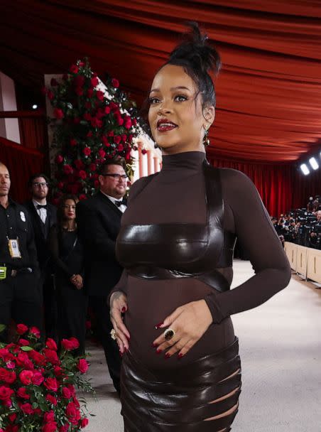 PHOTO: Rihanna poses on the champagne-colored red carpet during the Oscars arrivals at the 95th Academy Awards in Hollywood. (Mario Anzuoni/Reuters)