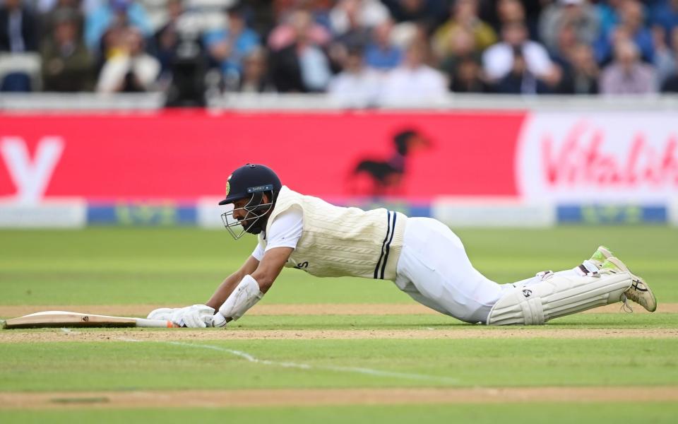 Cheteshwar Pujara of India dives to make his ground during Day One of the Fifth Lv= Insurance Test Match at Edgbaston on July 01, 2022 in Birmingham, England. - Alex Davidson/Getty Images Europe