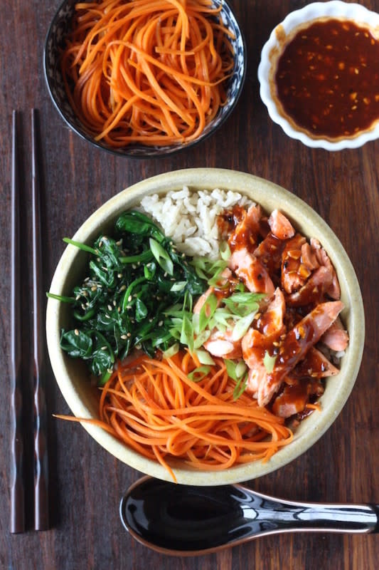 <p>Season with Spice</p><p>This salmon brown rice bibimbap will be your favorite type of dinner. A bowl with a little bit of everything—textures, colors, flavors, nutrients—and all mixed up to tease the tongue with every spoonful.</p><p><strong>Get the recipe: <a href="http://blog.seasonwithspice.com/2015/11/salmon-bibimbap-korean-recipe.html?m=1" rel="nofollow noopener" target="_blank" data-ylk="slk:Salmon Bibimbap;elm:context_link;itc:0;sec:content-canvas" class="link rapid-noclick-resp">Salmon Bibimbap</a></strong></p>