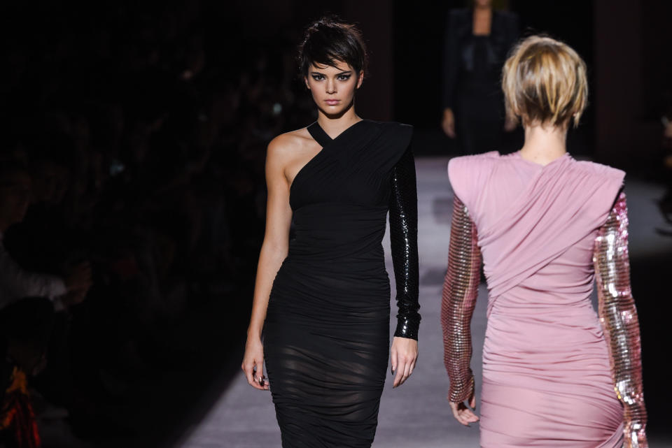 Left: Kendall Jenner, Right: Gigi Hadid at the Tom Ford SS18 show. (Photo: Getty)