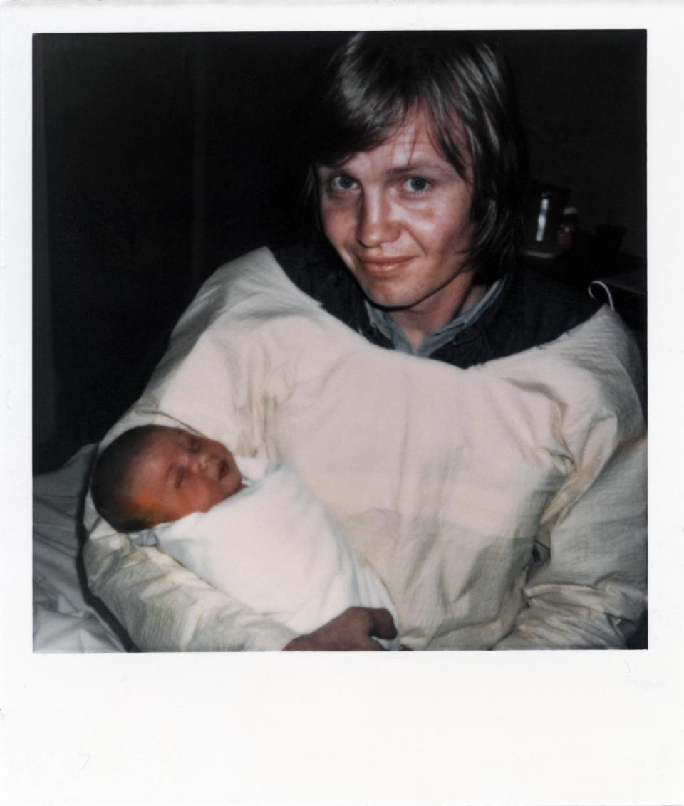 LOS ANGELES - JUNE 4:  Actor Jon Voight holds his new born baby Angelina Jolie Voight (only 4 hours old) on June 4, 1975 in Los Angeles, California. (Photo by Donaldson Collection/Michael Ochs Archives/Getty Images)