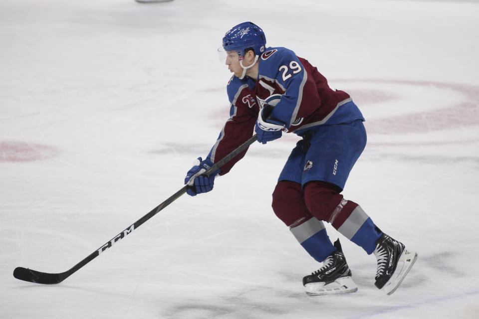 Colorado Avalanche center Nathan MacKinnon plays against the Minnesota Wild during an NHL hockey game, Saturday, Jan. 30, 2021, in St. Paul, Minn. (AP Photo/Andy Clayton-King)