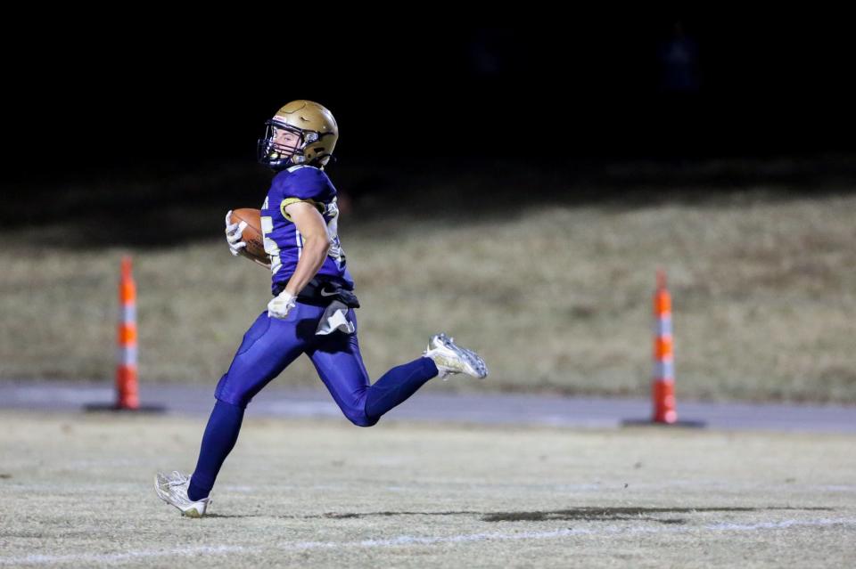 Hayden's Kade Mitchell runs for the touchdown against Santa Fe Trail in the regional championship game on Friday, Nov. 3.