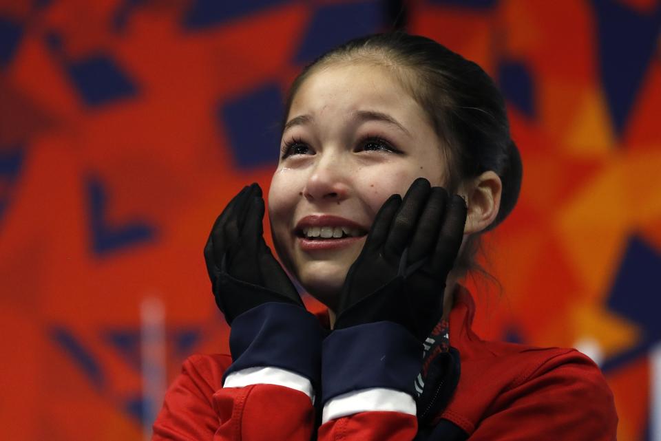 Alysa Liu reacts after her score was announced in the women's free skate during the U.S. Figure Skating Championships, Friday, Jan. 25, 2019, in Detroit. Liu won the title. (AP Photo/Carlos Osorio)