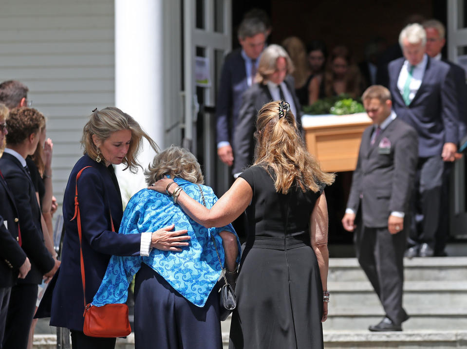 BARNSTABLE, MA - AUGUST 5: Courtney Kennedy Hill, center with head down, is consoled by Maria Shriver, right, and Sydney Lawford McKelvy, left, while she looks on as the casket of her daughter is taken from the church after funeral services for Saoirse Roisin Kennedy Hill are held at Our Lady of Victory Church in the Centerville section of Barnstable, MA on Aug. 5, 2019. Mourners gathered at Our Lady of Victory Church on Monday for the funeral of 22-year-old Saoirse Kennedy Hill, the granddaughter of Robert F. Kennedy who died last week. (Photo by David L. Ryan/The Boston Globe via Getty Images)