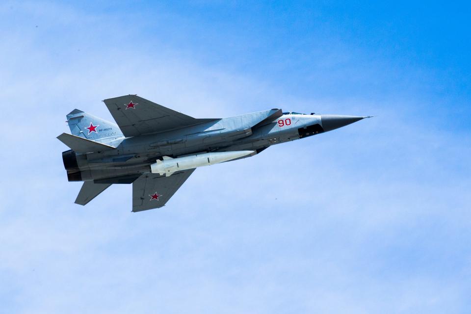 FILE In this file photo taken on Wednesday, May 9, 2018, a Russian Air Force MiG-31K jet carries a high-precision hypersonic aero-ballistic missile Kh-47M2 Kinzhal during a Victory Day military parade.