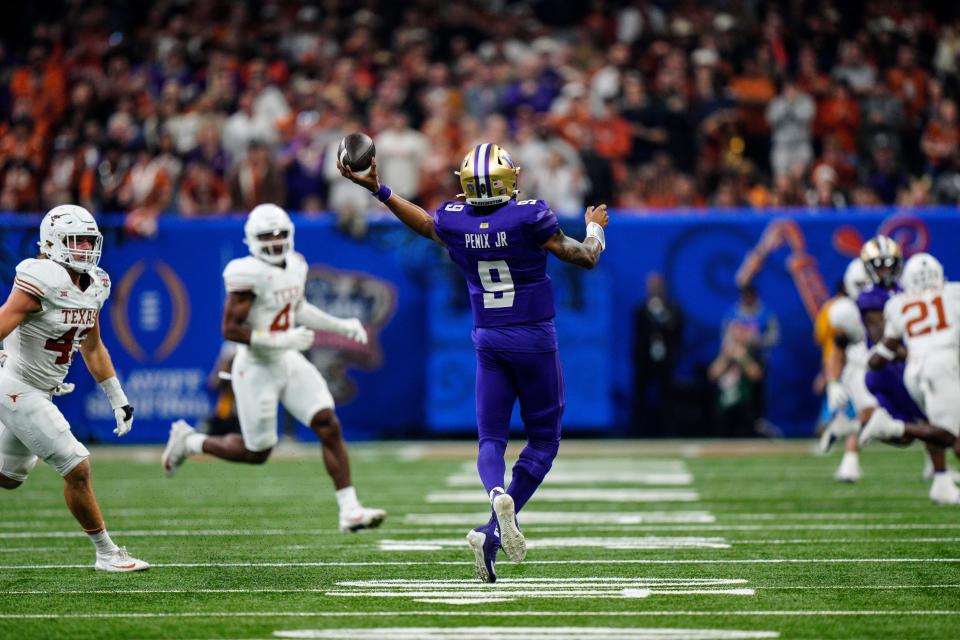 Washington quarterback Michael Penix Jr. (9) pases the ball against Texas during the first half of the Sugar Bowl CFP NCAA semifinal college football game, Monday, Jan. 1, 2024, in New Orleans. (AP Photo/Jacob Kupferman)