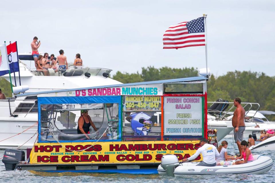 D’s Sandbar Munchies concession stand its seen navigating by the Bill Bird Marina at Haulover Park in North Miami during the first day of Memorial Day Weekend, Saturday, May, 23, 2020.