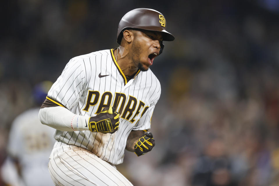 San Diego Padres' Jose Azocar celebrates after hitting a walkoff single to defeat the Milwaukee Brewers 3-2 during the tenth inning of the baseball game Monday, May 23, 2022, in San Diego. (AP Photo/Mike McGinnis)