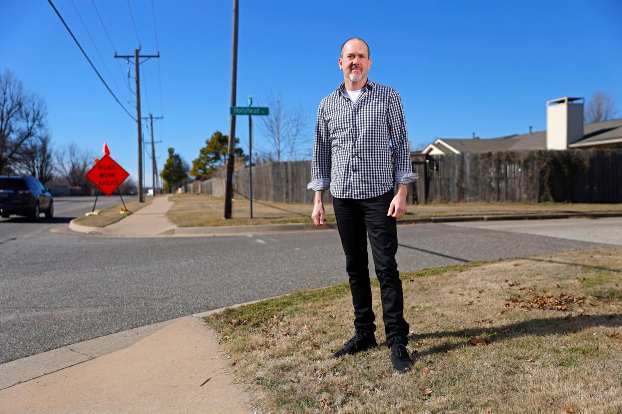 James King is pictured Tuesday, Jan. 30, 2024, at the entrance to his neighborhood off SW 15 in Oklahoma City. His neighborhood is near the proposed Sunset Amphitheater to be developed by Colorado Springs-based Notes Live.