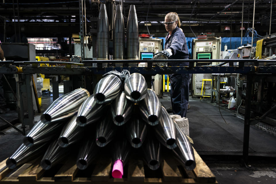 A steel worker moves a 155 mm M795 artillery projectile during the manufacturing process at the Scranton Army Ammunition Plant in Scranton, Pa., Thursday, April 13, 2023. One of the most important munitions of the Ukraine war comes from a historic factory in this city built by coal barons, where tons of steel rods are brought in by train to be forged into the artillery shells Kyiv can’t get enough of — and that the U.S. can’t produce fast enough. (AP Photo/Matt Rourke)